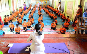 Rows-of-children-meditating-on-heart-center-Jaffna-with-Kriyananadamayi (click image to enlarge)